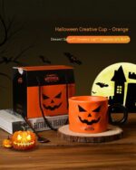 Orange halloween pumpkin cup with bat and moon decorations, presented in a gift box.