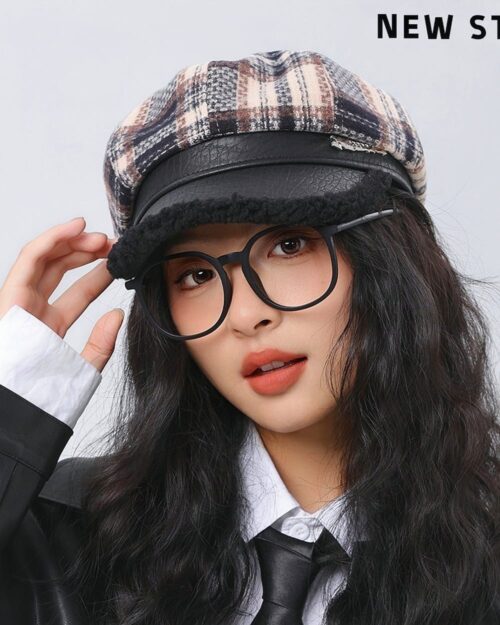 Retro plaid beret, a french aesthetic beret, worn by a woman.