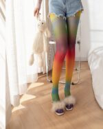 Colorful japanese rainbow socks worn by a person, showcasing a vibrant rainbow pattern.