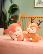 Two adorable baby deer plushies resting together. Soft, plush baby deer plushie toys.