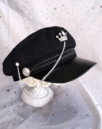 Black gothic style army hat with chain and crown embellishments.