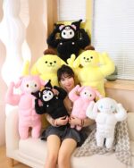 A collection of sanrio muscular plushies, including Kuromi and Hello Kitty, displayed with a person.