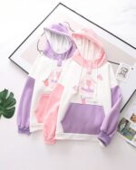 Kawaii happy rabbit hoodie featuring Foodi & Happy design on a white and purple sweatshirt.