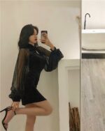 Black korean aesthetic dress, a short, sheer high-neck design with long sleeves.