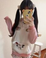 Pink embroidered jojifuku aesthetic sweater with cute animal motifs and lace trim.