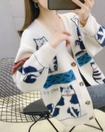 Otom Cat Cardigan Sweater - Vintage design, featuring cat illustrations on a knit cardigan.