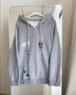 Gray cat paw hoodie with kawaii illustrations and a zip-up front.