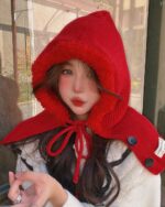 Red Korean Balaclava Hat worn by a woman outdoors.