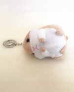 Kawaii chibi hamster plushie keychain, a small, fluffy, and adorable plush toy with a ring for attaching.
