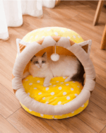 Kawaii animal-themed cat bed with a fluffy interior and polka dot cushion, featuring cat ears.