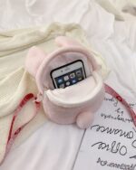 Pink chibi loli handbag with an iPhone and stationery.