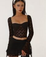 Black lace coquette aesthetic set with long sleeves and a low-cut design.