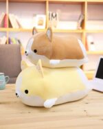 Two kawaii corgi plushies stacked together, soft and cuddly.