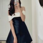 Black and white single bow french aesthetic dress, off-the-shoulder style.