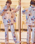 Strawberry Lamb kawaii pajamas featuring a light pink and white print with strawberries and lamb motifs.