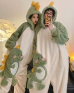 Pajama Dino-Shark jumpsuit couple set featuring plush dino-shark costumes.