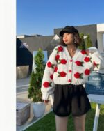 White vintage aesthetic cardigan with red rose embroidery, long-sleeved knit top.