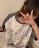 White animecore aesthetic shirt with a black and white anime illustration.