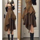 Two-piece retro aesthetic dress featuring a corset top and layered skirt. It has lacing details and a unique, asymmetrical design.