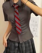 Summer Uniform Set - Preppy Aesthetic: Black shirt and plaid skirt with red tie, showcasing a classic preppy aesthetic uniform.