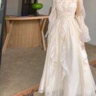 Cream French Style Long Sleeve Dress, a coquette aesthetic dress with ruffles and puff sleeves.