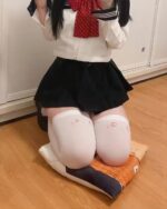 Kawaii kaomoji cute stockings on a person's legs, featuring small printed symbols.