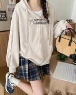 Romantic zipper hoodie featuring 'ROMANTIC LONG ISLAND' print on a beige fleece sweatshirt.