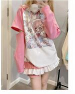 Printed pink kawaii t-shirt with anime-style illustration, oversized fit.