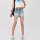 High waist y2k denim skirt with a light wash and a flattering fit.