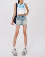 High waist y2k denim skirt with a light wash and a flattering fit.