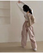 Woman wearing korean aesthetic pants, loose-legged and wide-legged style.