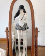 Y2k Lolita Set featuring a white long sleeve top and gray ruffled skirt.