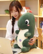 A green kawaii dino plushie, soft and cuddly, as aesthetic room decor.