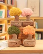 Set of colorful plush potted trees (plush potted tree) in a woven basket.