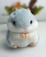 Cute kawaii chibi hamster plushie, soft and fluffy toy for collection or keychain.