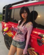 Retro Style Long Sleeves Pink Top - Cutecore Aesthetic, model wearing pink top and denim shorts.