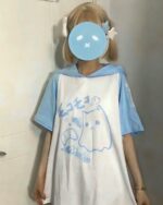 A light blue Ghost Neko hooded t-shirt with a cute ghost cat design, showcasing Harajuku aesthetic style.
