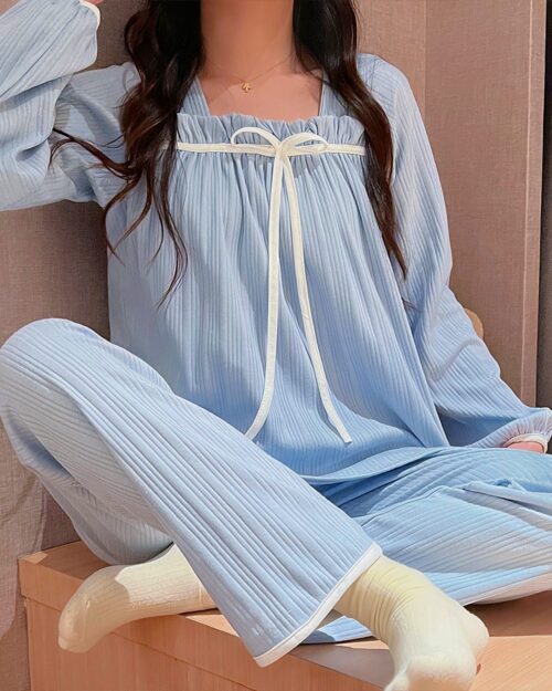 Light blue milk silk korean aesthetic pajamas set with long sleeves and drawstring closure.