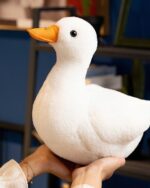 Goosy the White Duck Plushie, a soft, white, stuffed duck toy.