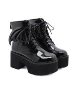 Black gothic leather boots with platform sole and lace-up detail.