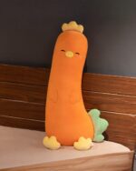 Long vegetable plushie, a soft, orange carrot plush toy with details.