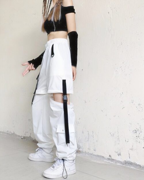 White detachable y2k aesthetic pants with cargo pockets and adjustable straps. Featuring a two-way ankle design.