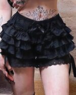 Black puffy gothic coquette skirt with ruffles and lace trim.