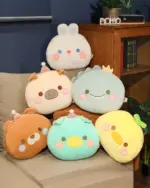 Round animal hand warmer plushies, including bunny, pig, shrimp, and more.