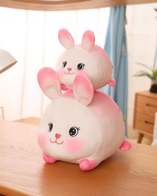 Kawaii Berry the Strawberry Bunny Plushie, a soft pink plush rabbit toy.