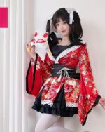 Woman wearing a red and white fox kimono with lace details and a matching mask.