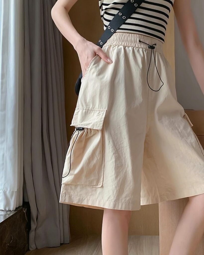 Casual loose shorts in Korean aesthetic style featuring pockets and drawstring waist.