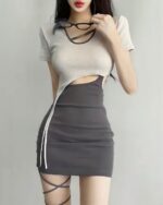 Coquette aesthetic dress featuring a ribbed crop top and a high-waisted pencil skirt with straps.