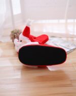 Santa cotton slippers featuring a red and white design with a non-slip sole.