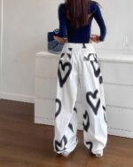 White High Waist Loose Pants with y2k aesthetic heart print. Wide-leg style.